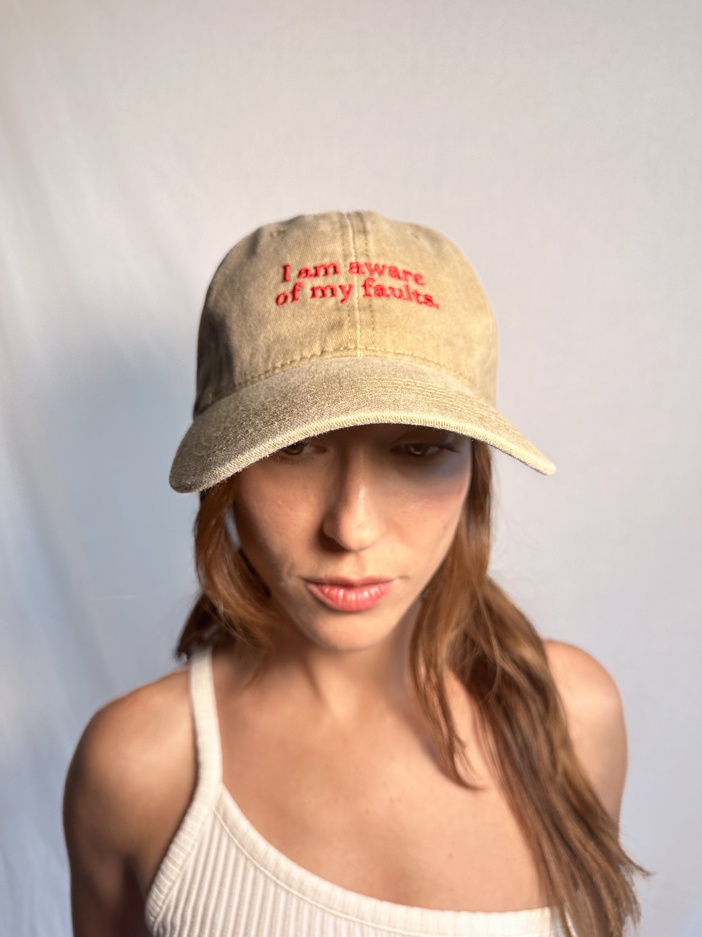 I am aware of my faults. Cap