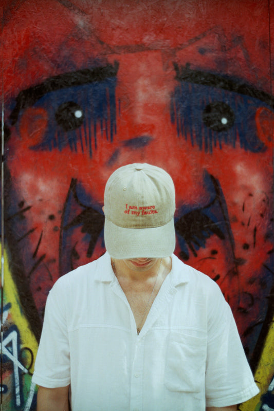 I am aware of my faults. Cap